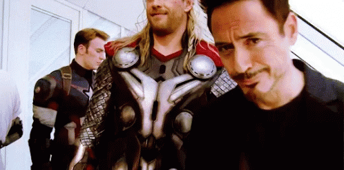 Group of Men in Superhero Costumes