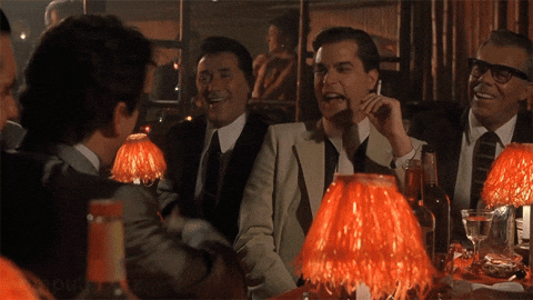 Group Of Men Laughing At Casino Movie GIF
