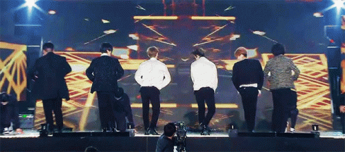 Group Of Men On Stage GIF