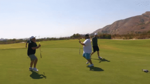 Group of Men Playing Golf