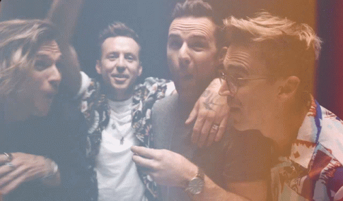 Group Of Men Posing One With Watch GIF
