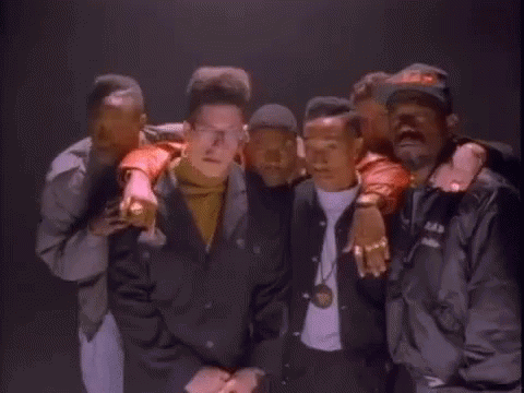 Group of Men Posing With L.A.D. Jacket