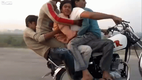 Group of Men Riding Motorcycle With Letter R