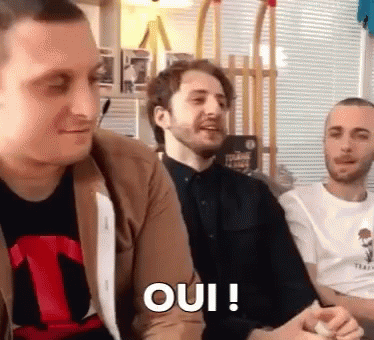 Group of Men Saying Oui