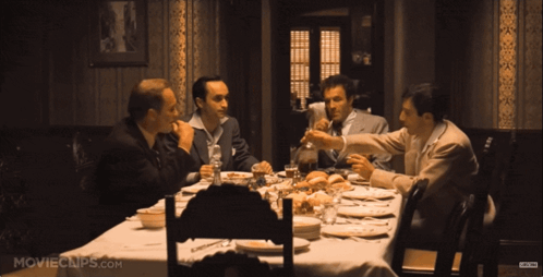 Group of Men Sitting Around Table Movieclips.com