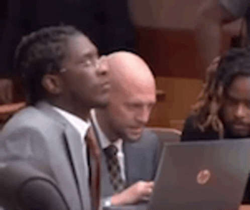 Group Of Men Sitting At Table With Laptops GIF