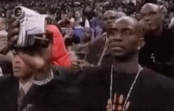 Group Of Men Watching Basketball Game In Stadium GIF