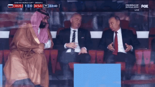 Group of Men Watching Soccer Game Score 1-0