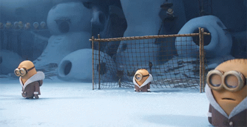 Group Of Minions Standing In Front Of Soccer Goal GIF