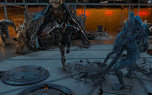 Group Of Monsters Standing In Room With Kepler GIF