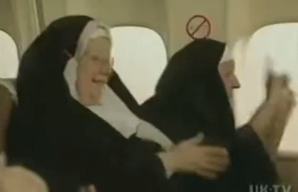 Group of Nuns Sitting on Plane