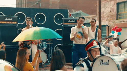 Group Of People Around Drum Saying Pearl GIF