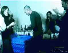 Group of People Around Table with Bottles