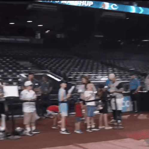 Group Of People At ABC Sign GIF