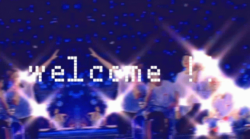 Group Of People At Welcome Sign GIF