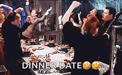 Group of People Dancing Around Table Dinner Date