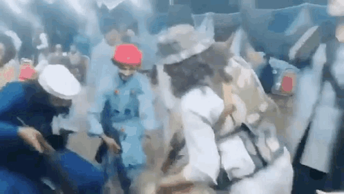 Group Of People Dancing In Smoky Room GIF