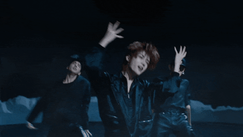 Group of People Dancing in the Dark