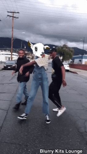 Group of People Dancing on Street With Blurry Kits Lounge