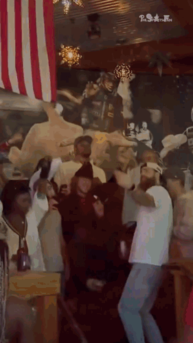 Group Of People Dancing With American Flag GIF
