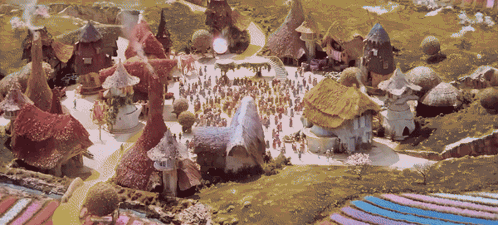 Group Of People Gathered In Small Village GIF