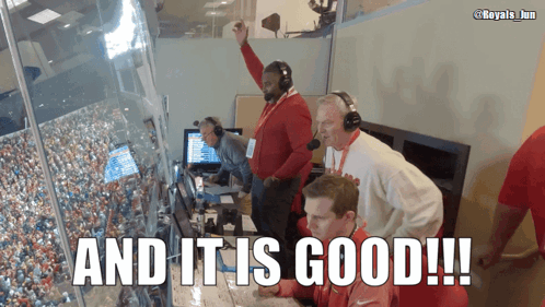 Group of People in a Room Saying And It Is Good