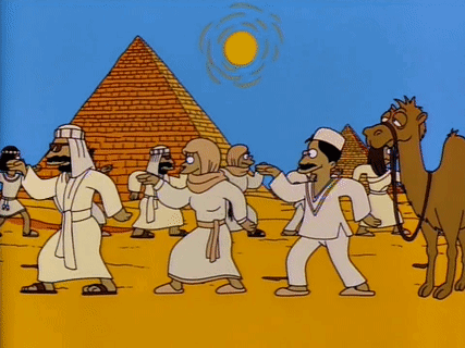 Group Of People In Front Of Pyramid GIF