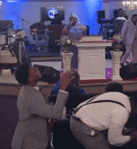 Group Of People In Room With K2 Sign GIF