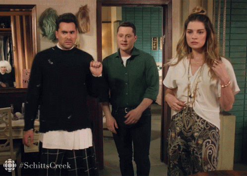 Group Of People In Room With Schitts Creek GIF