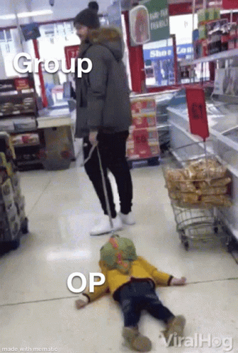 Group Of People In Store One Laying On Ground GIF