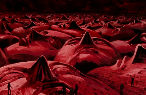 Group of People Laying in Field of Blood