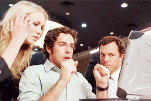 Group of People Looking at Computer Monitor