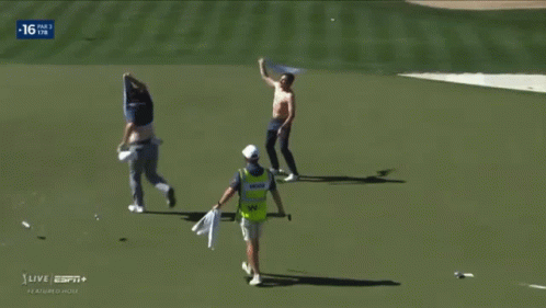 Group of People on Golf Course With ESPN