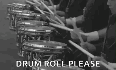Group of People Playing Drums