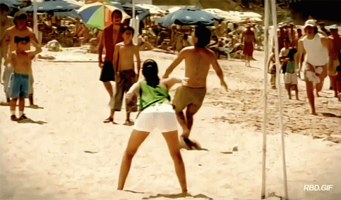 Group of People Playing Volleyball on Beach RBD GIF