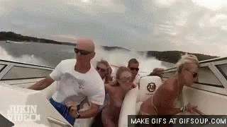 Group Of People Riding Boat GIF