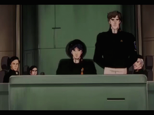 Group of People Sitting at Table He Means to Die Doesn't He