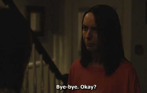 Group of People Sitting at Table Saying Bye-b--