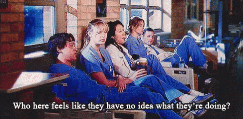 Group of People Sitting in a Row