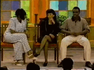 Group of People Sitting in Chairs