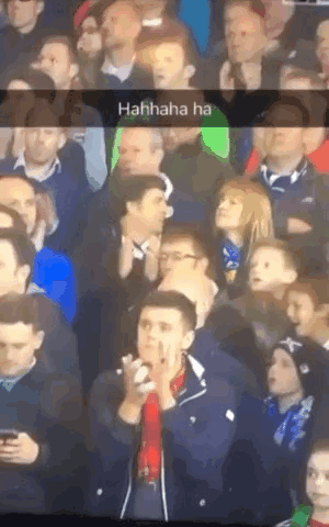 Group of People Sitting in Stadium Saying Hahhaha Ha