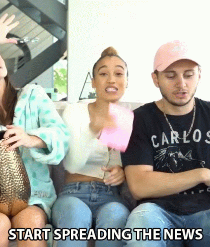Group of People Sitting on Couch Saying Start Spreading the News