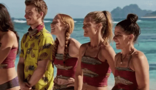 Group of People Standing on Beach