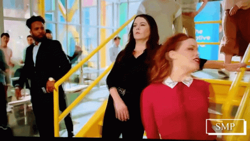 Group Of People Standing On Stairs SMP GIF