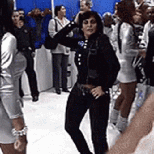 Group Of People With Dancing Woman GIF