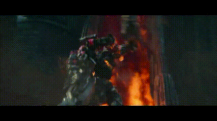 Group of Robots in Front of Burning Building