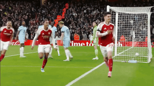 Group of Soccer Players With Coca Cola Ad