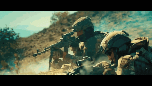 Group Of Soldiers Holding Guns In Dirt GIF