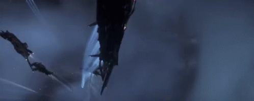 Group of Space Ships Flying Through Dark Space