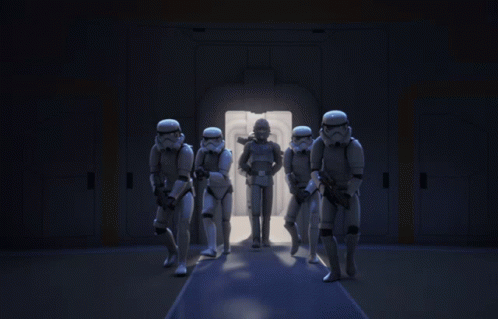 Group of Stormtroopers Standing in Dark Room